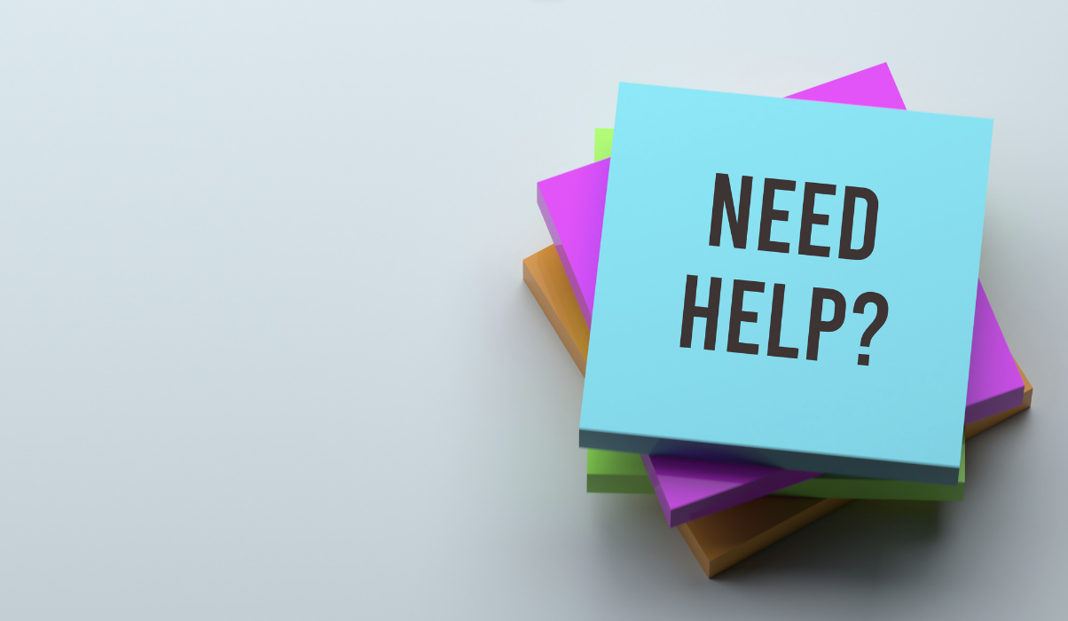 A post-it with "Need Help?" written on top.